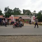 Personil Polsek Bengkayang Laksanakan Strong Point Gina Cegah Kemacetan